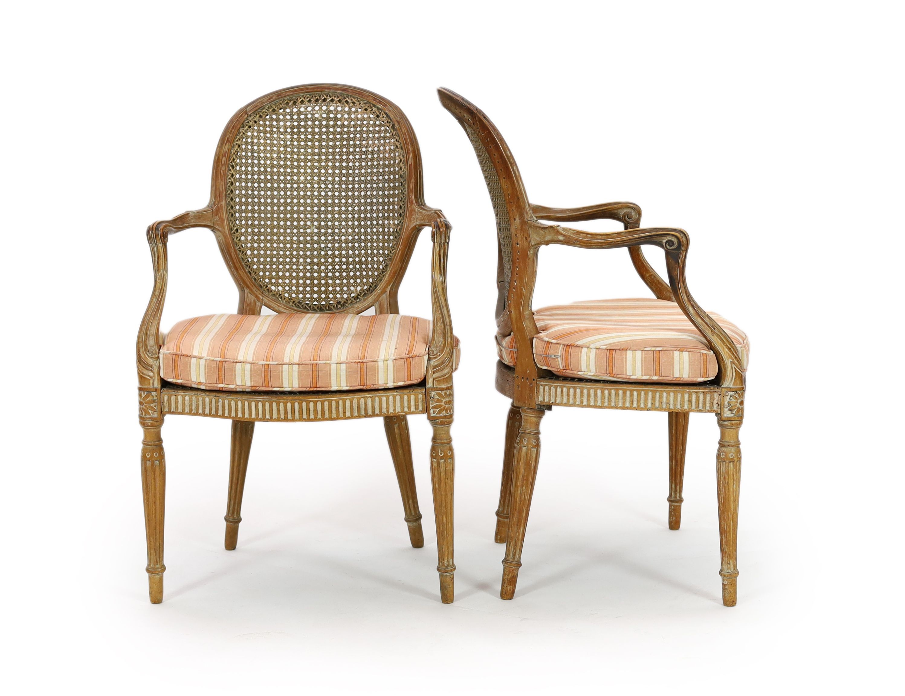 A set of four late 18th century French carved beech fauteuils, W.54cm D.53cm H.91cm